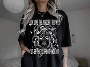 Look Like The Innocent Flower....Black Tee